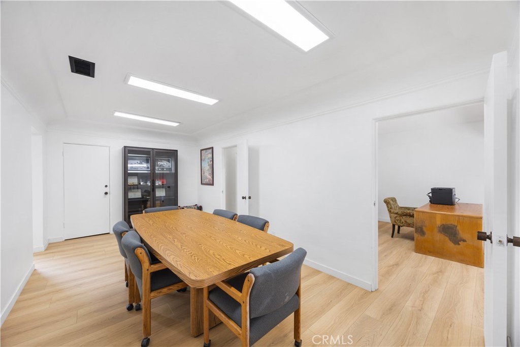 14128 Paramount Boulevard Paramount, CA 90723 - Photo 22 of 42 a view of a dining room with furniture