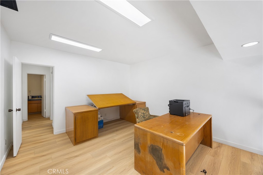 14128 Paramount Boulevard Paramount, CA 90723 - Photo 23 of 42 a room with a table and chairs
