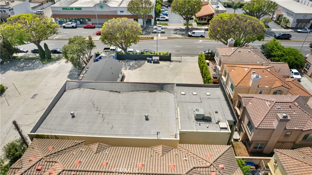 14128 Paramount Boulevard Paramount, CA 90723 - Photo 33 of 42 an aerial view of a house with a yard
