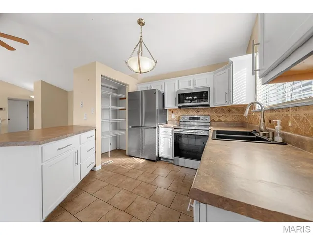 $249,000 | 14314 Riverfront Drive, Florissant, MO 63034