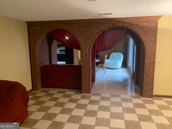 a view of entryway with a front door