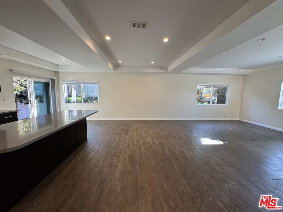 24842 Frampton Avenue Harbor City, CA 90710 - Photo 15 of 26 a view of a living room a window and wooden floor