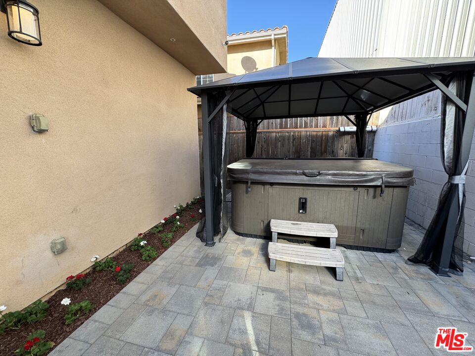 24842 Frampton Avenue Harbor City, CA 90710 - Photo 18 of 26 a view of table and chair in the patio