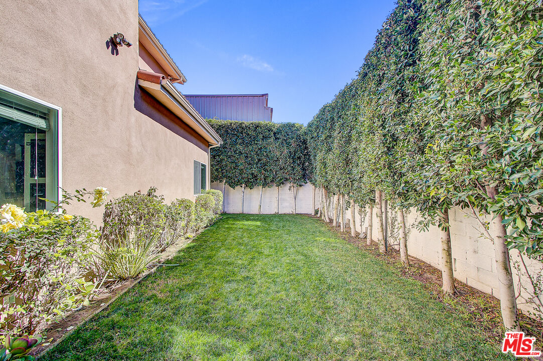 24842 Frampton Avenue Harbor City, CA 90710 - Photo 2 of 26 a backyard of a house with lots of green space