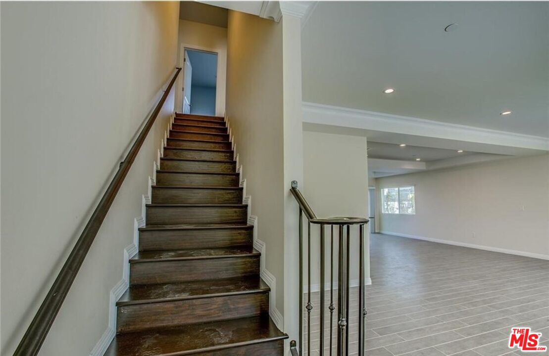 24842 Frampton Avenue Harbor City, CA 90710 - Photo 8 of 26 a view of entryway and hall with wooden floor