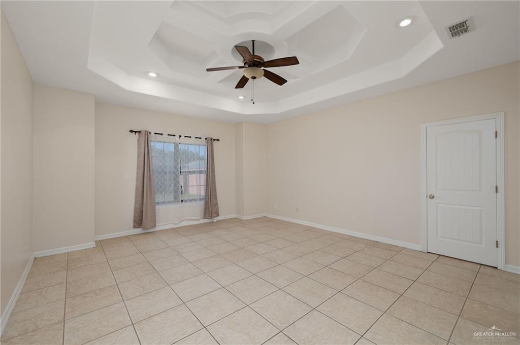 504 Orchard Court Weslaco, TX 78596 - Photo 11 of 24 a view of an empty room and window