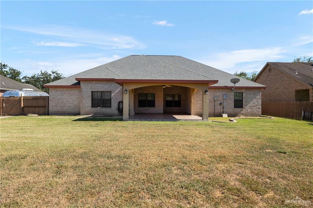 504 Orchard Court Weslaco, TX 78596 - Photo 19 of 24 front view of a house with a yard