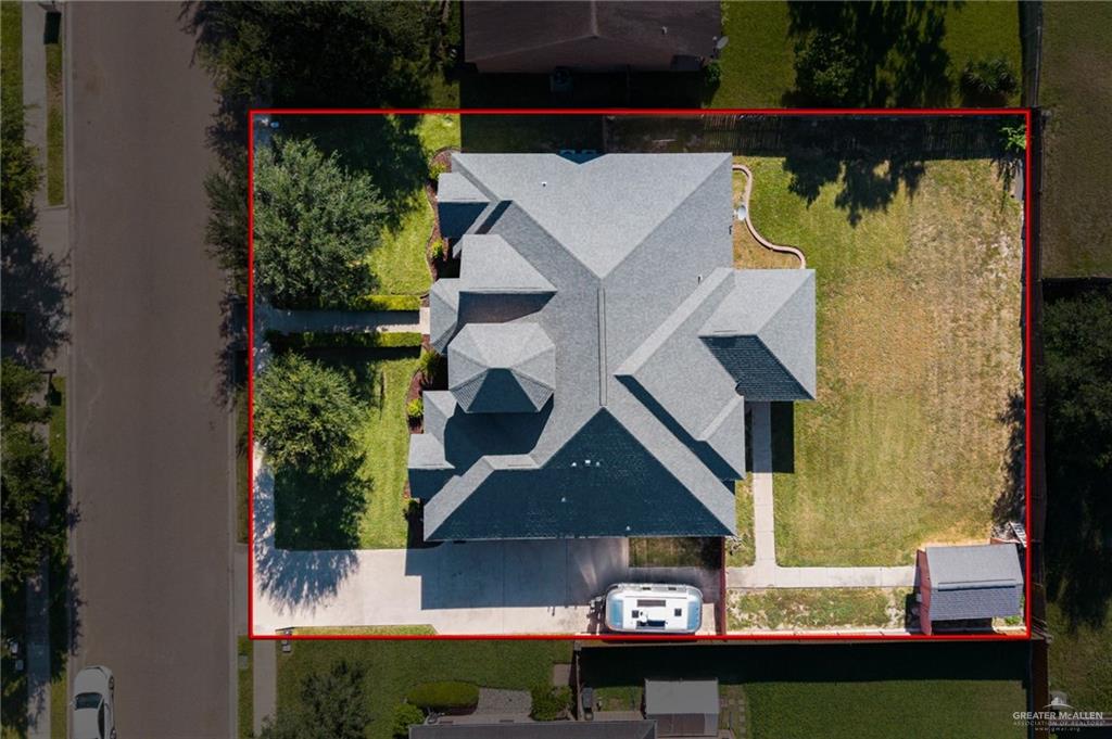 504 Orchard Court Weslaco, TX 78596 - Photo 22 of 24 an aerial view of a house with a yard