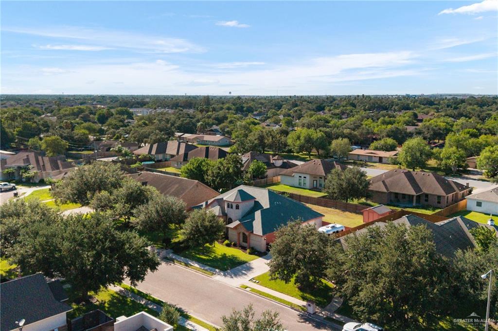 504 Orchard Court Weslaco, TX 78596 - Photo 23 of 24 an aerial view of residential houses with outdoor space