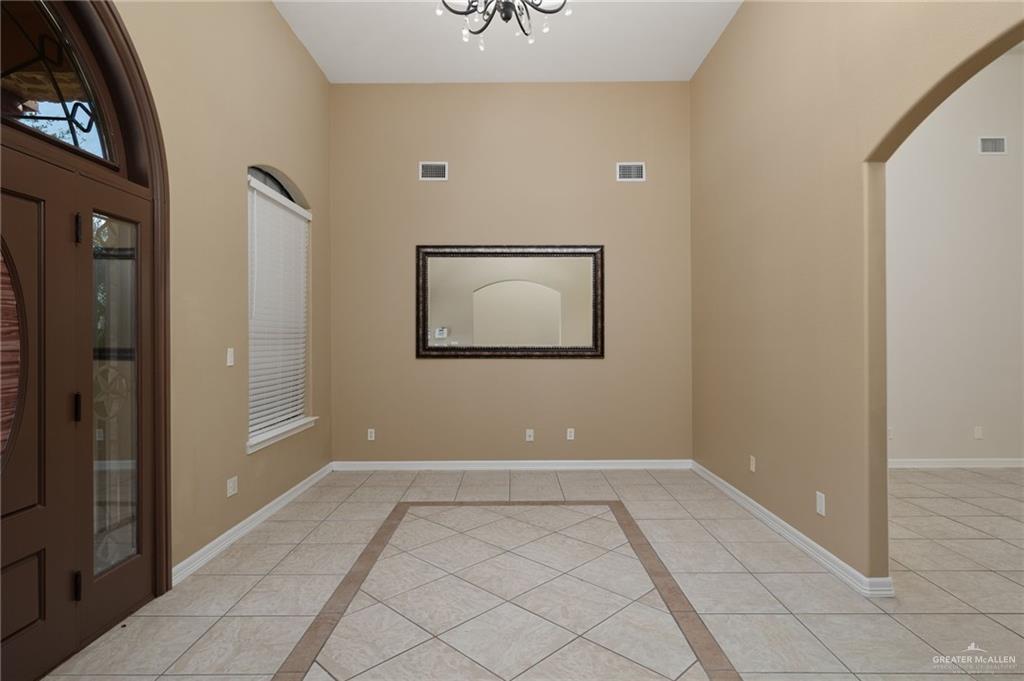 504 Orchard Court Weslaco, TX 78596 - Photo 4 of 24 a view of a hallway with closet
