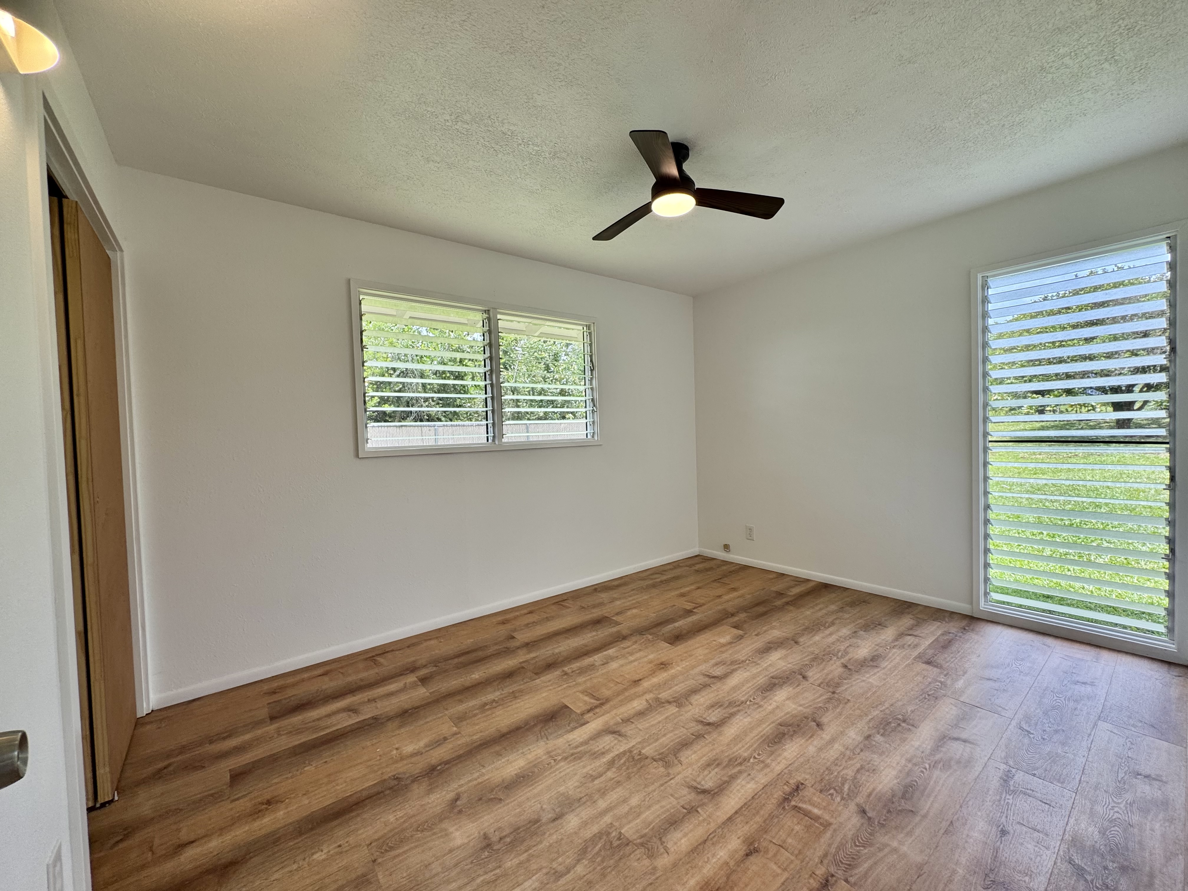 164 Likeke Street Hilo, HI 96720 - Photo 12 of 29 a view of empty room with windows
