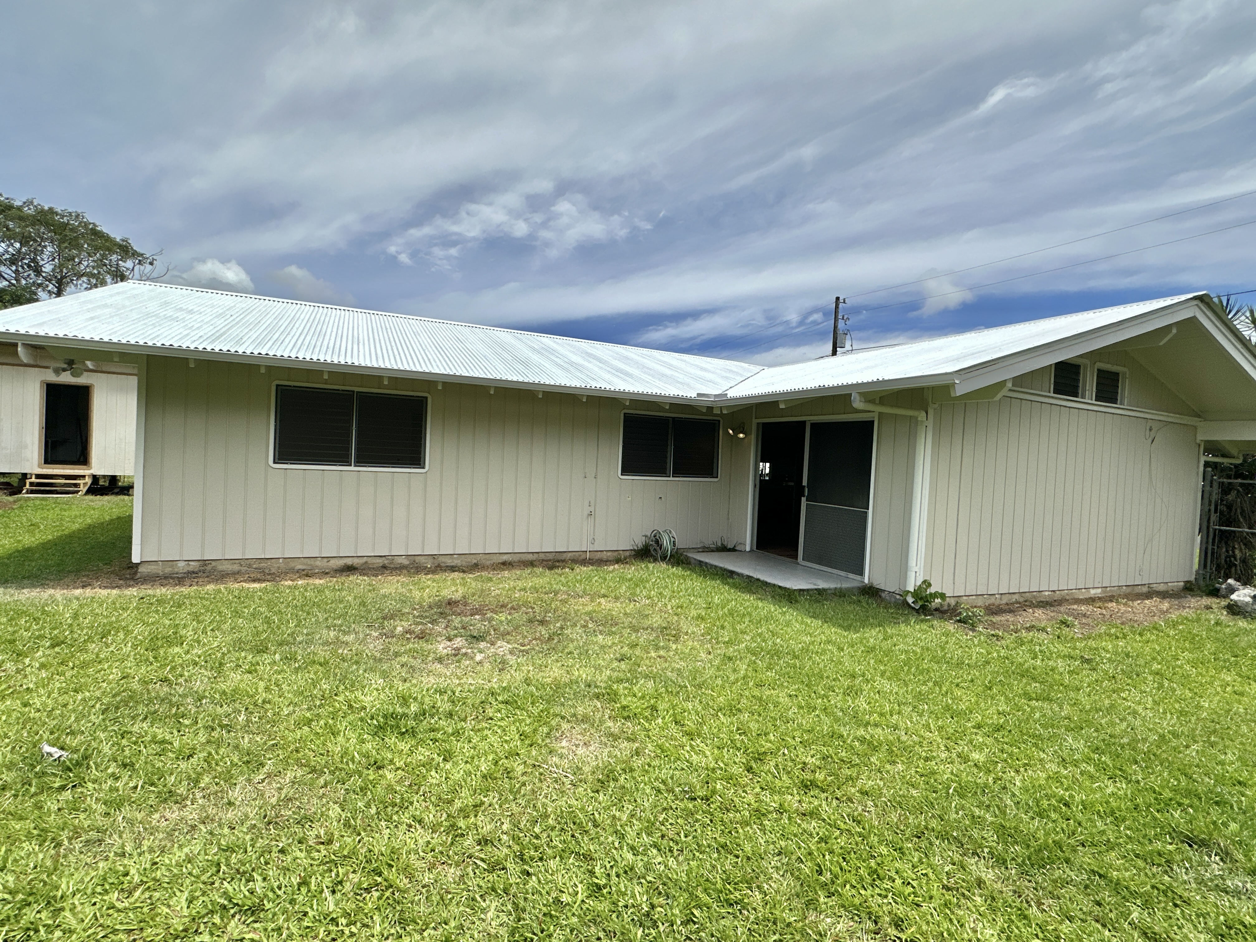 164 Likeke Street Hilo, HI 96720 - Photo 20 of 29 a backyard of a house with lots of green space