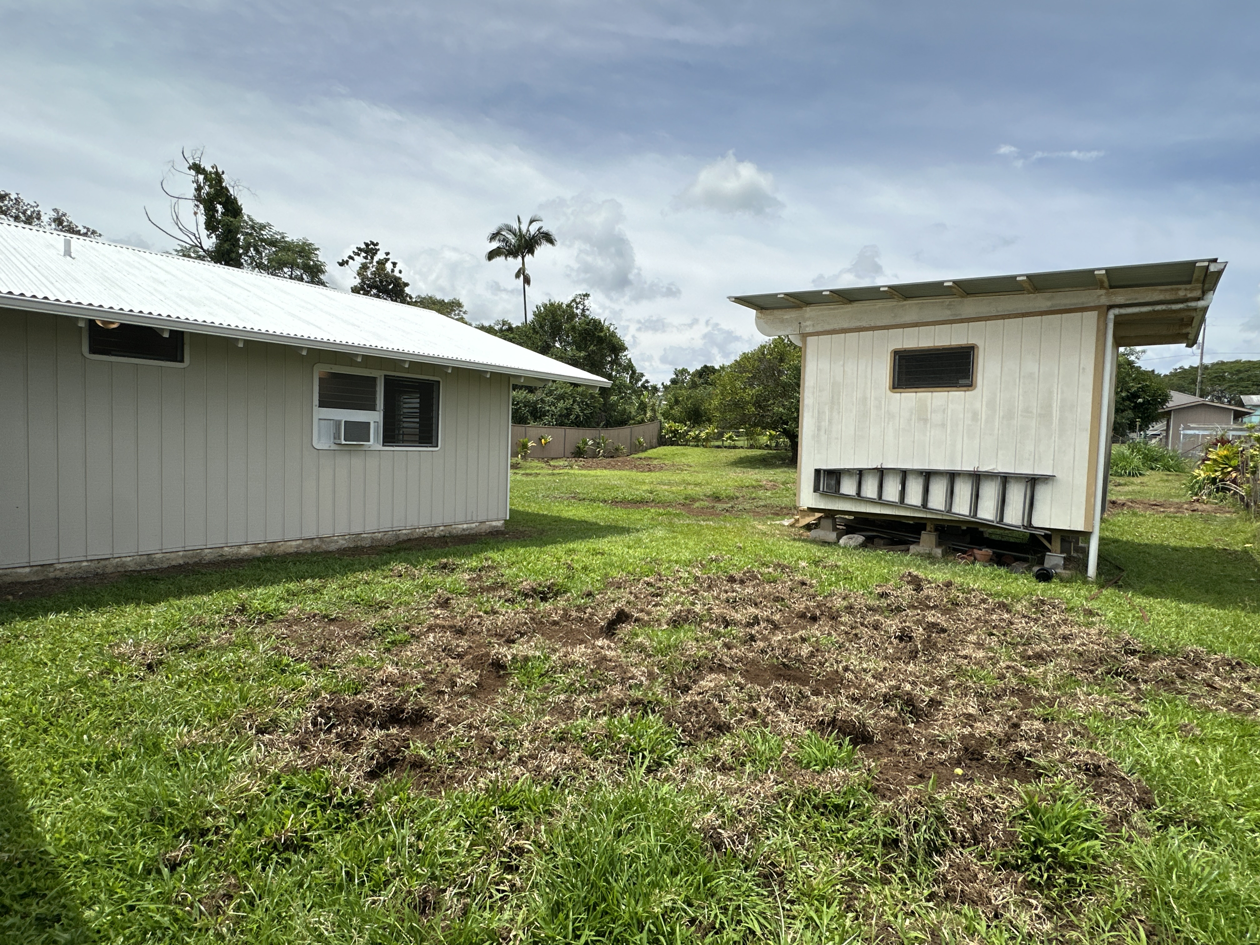164 Likeke Street Hilo, HI 96720 - Photo 23 of 29 a view of a house with a yard