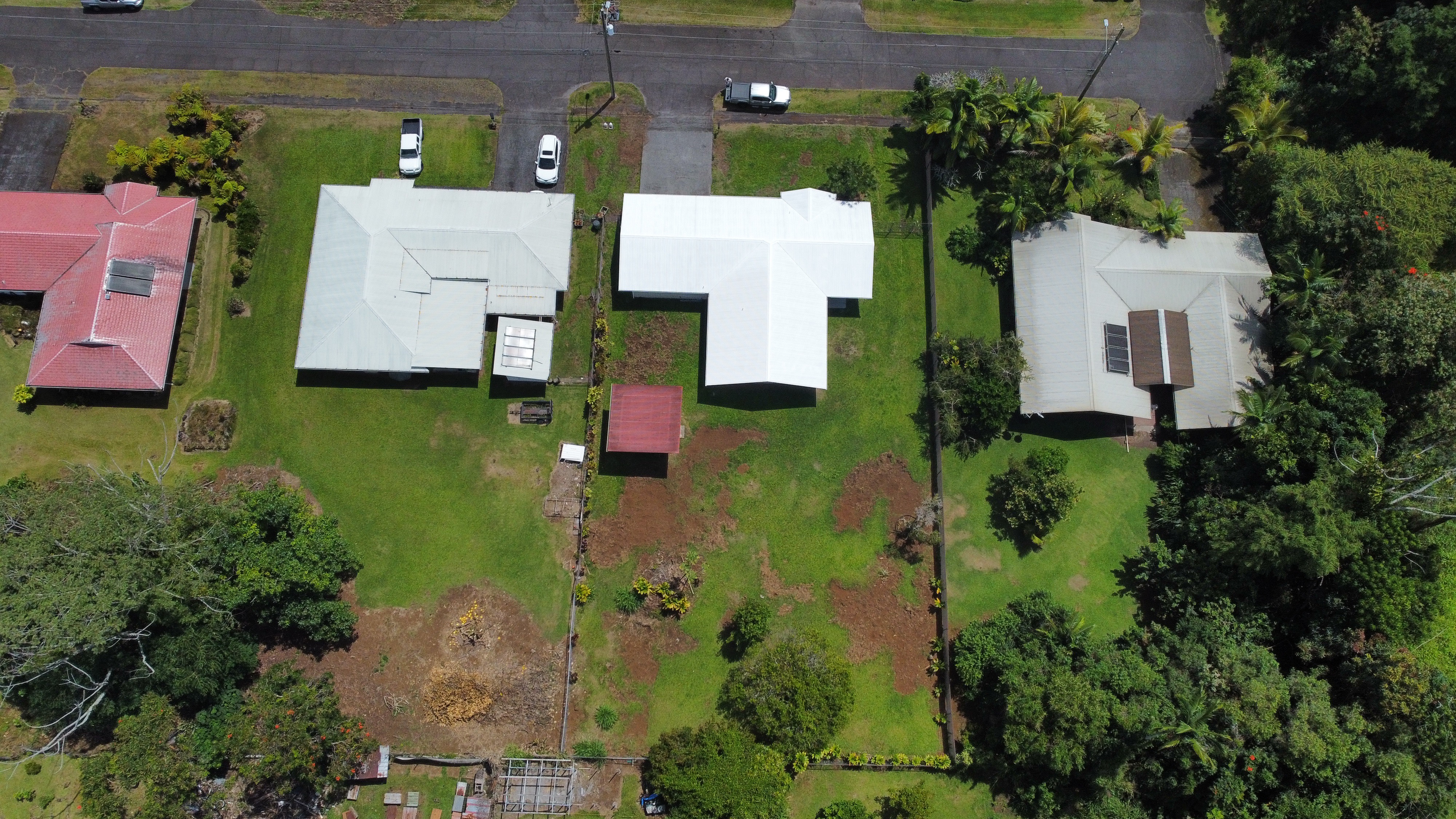 164 Likeke Street Hilo, HI 96720 - Photo 27 of 29 an aerial view of a house with a yard pool a yard and lake view