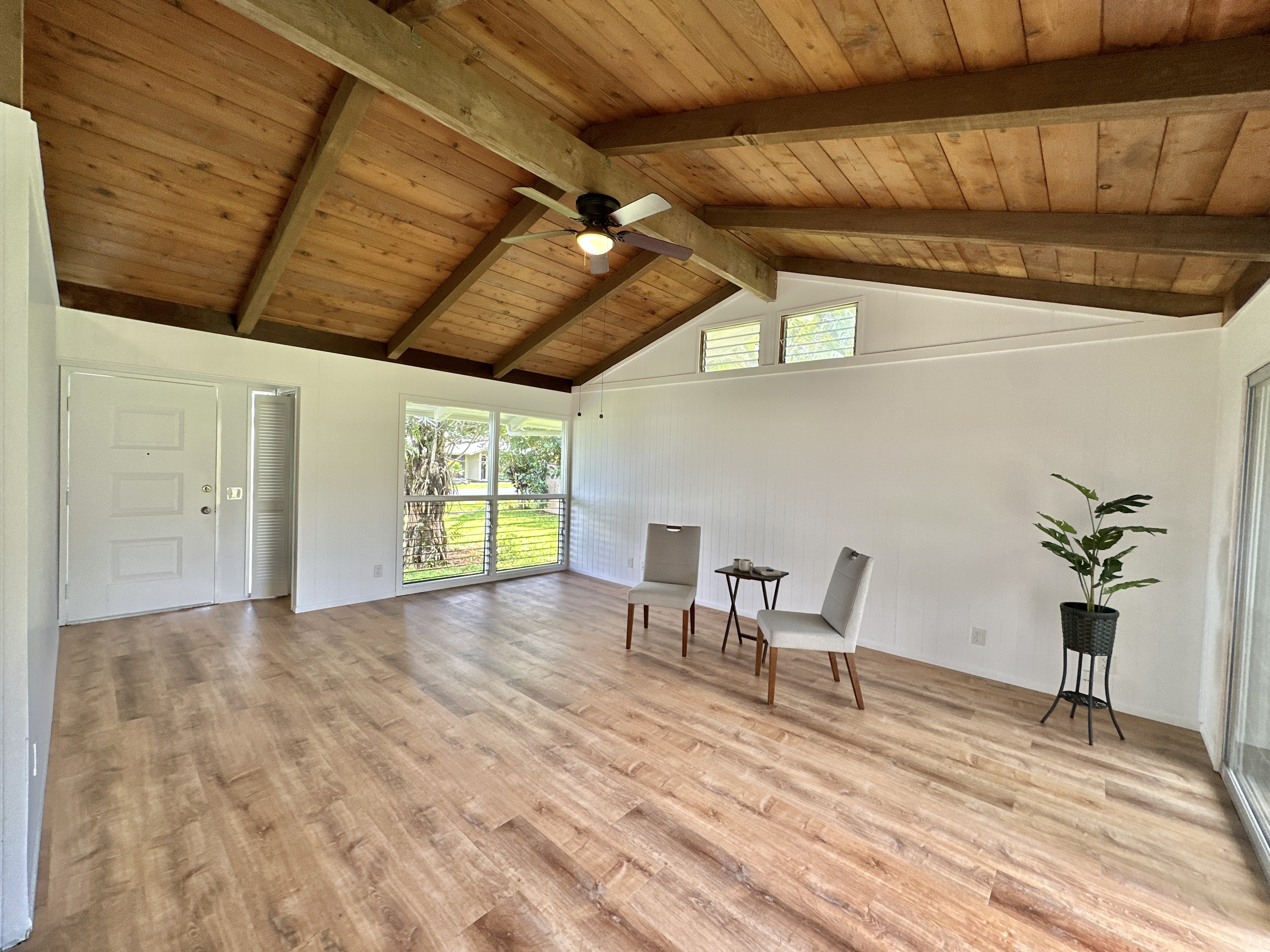 164 Likeke Street Hilo, HI 96720 - Photo 4 of 29 a view of a room with wooden floor and furniture