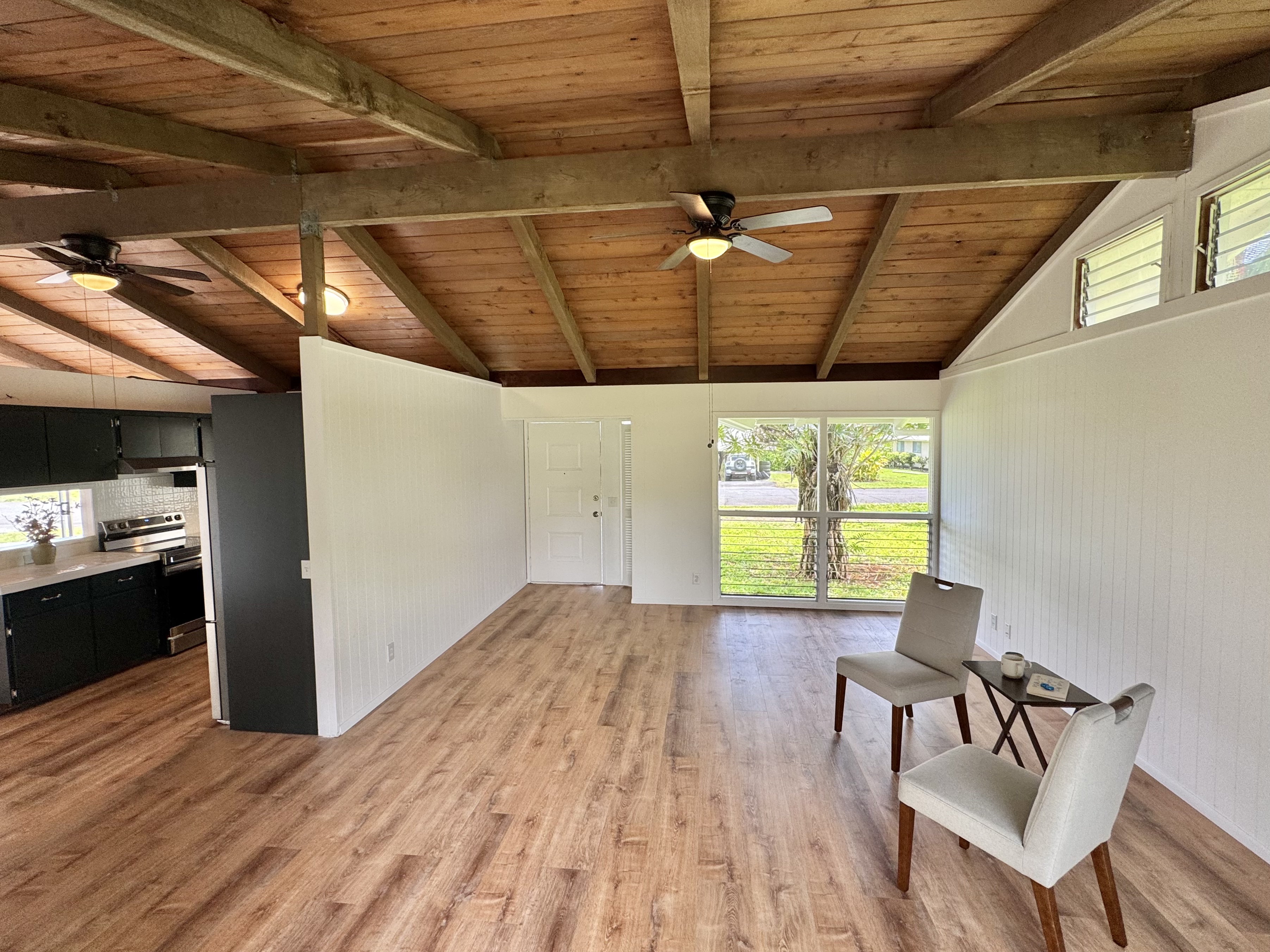 164 Likeke Street Hilo, HI 96720 - Photo 5 of 29 a view of a room with furniture window and wooden floor