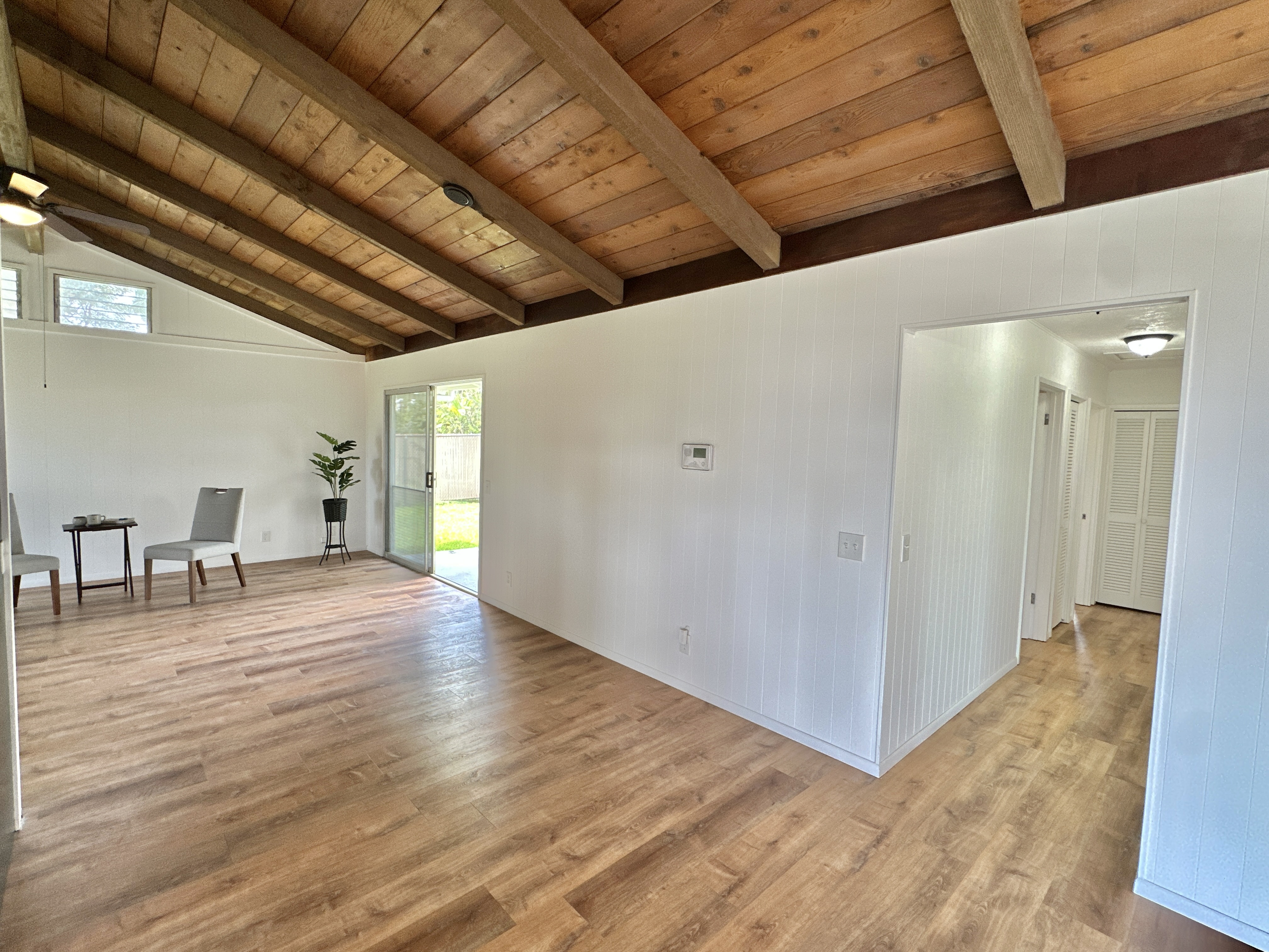 164 Likeke Street Hilo, HI 96720 - Photo 8 of 29 a view of livingroom with hardwood floor and a ceiling fan
