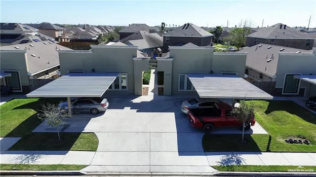 an aerial view of a house with a garden