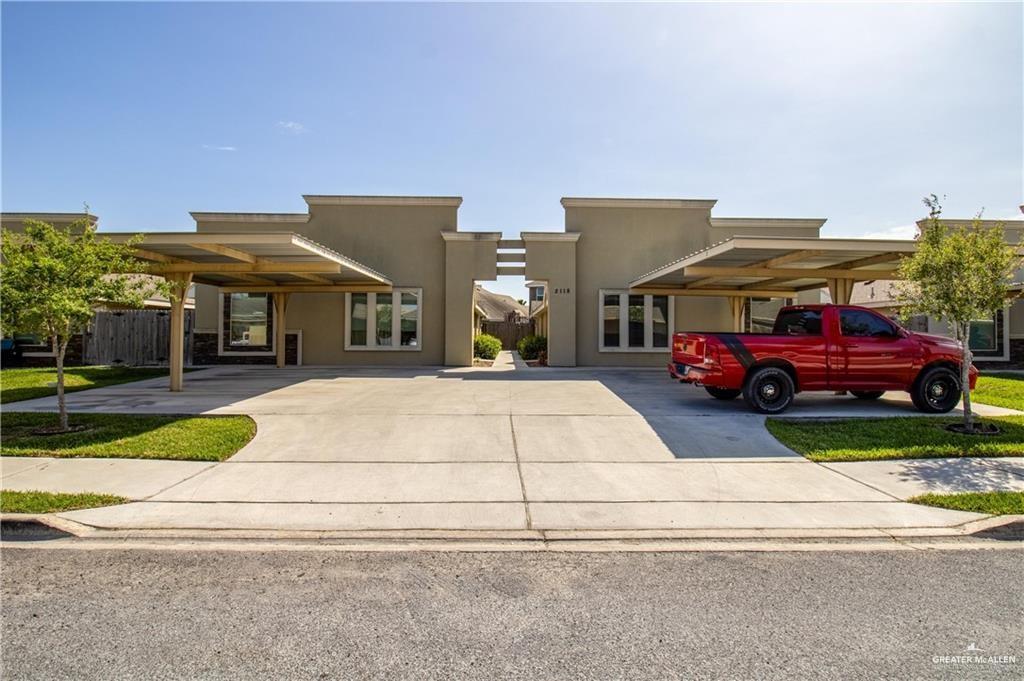 2118 Taxco Court, Unit 2 Edinburg, TX 78542 - Photo 13 of 13 a car parked in front of a house