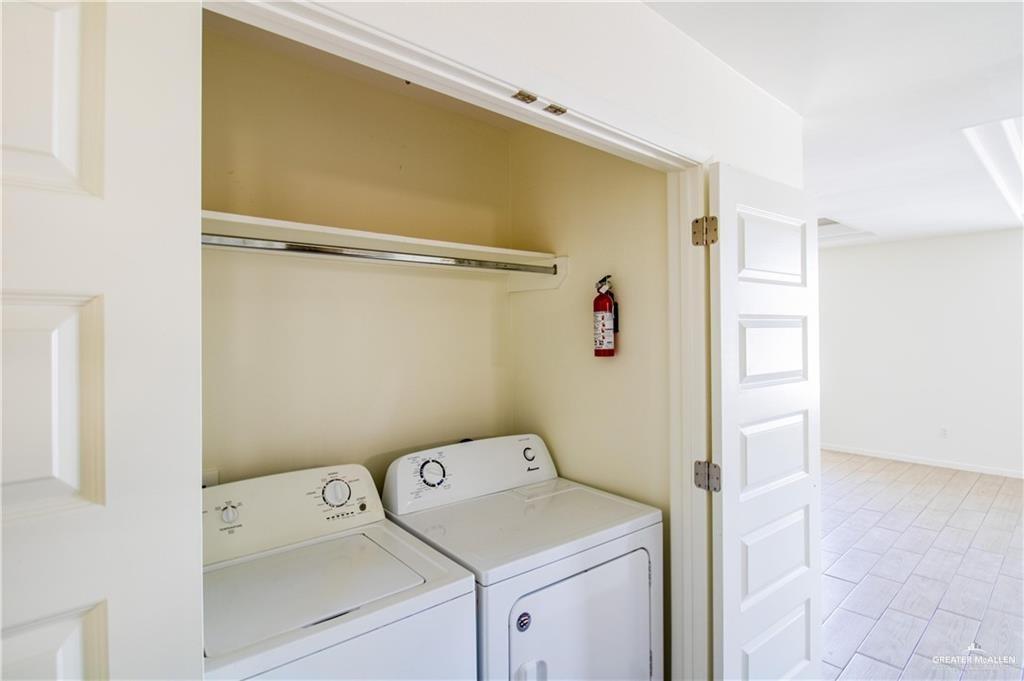 2118 Taxco Court, Unit 2 Edinburg, TX 78542 - Photo 8 of 13 a utility room with dryer and washer