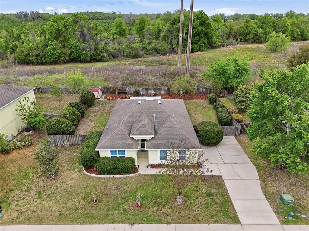 23152 Northwest 11th Road Newberry, FL 32669 - Photo 1 of 31 an aerial view of a house with pool