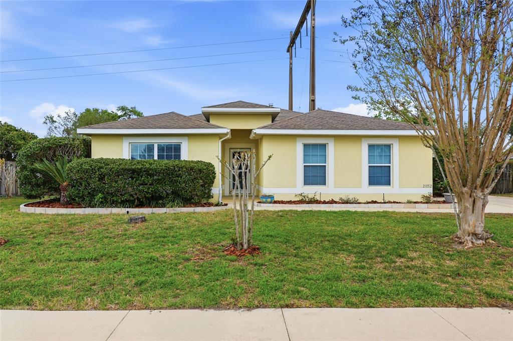 23152 Northwest 11th Road Newberry, FL 32669 - Photo 2 of 31 a view of a house with a backyard