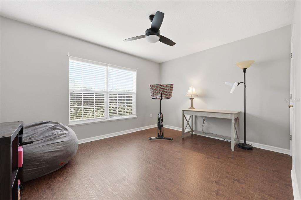 23152 Northwest 11th Road Newberry, FL 32669 - Photo 23 of 31 a view of a room with gym equipment