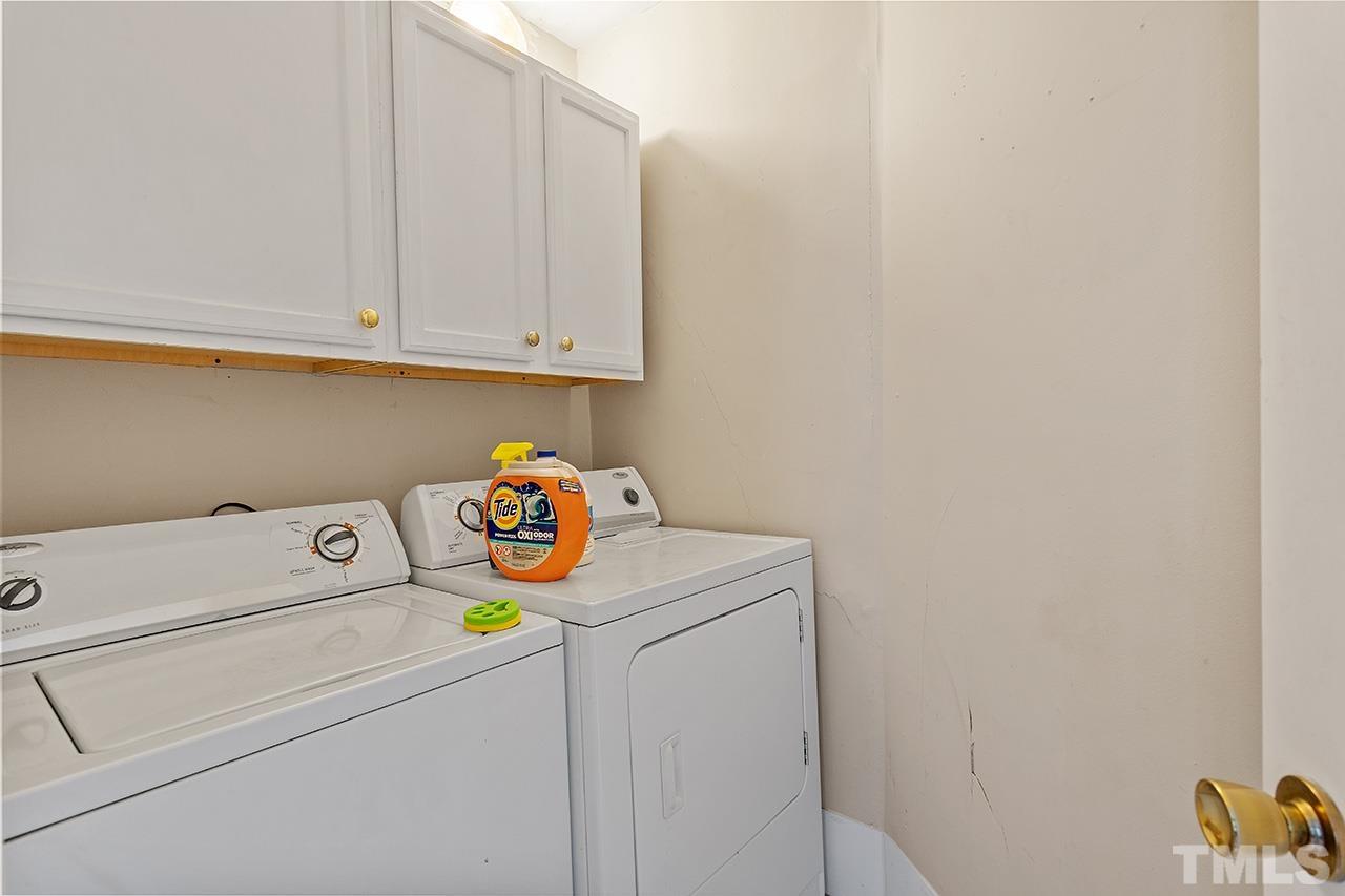 324 Cutler Street Raleigh, NC 27603 - Photo 16 of 34 a utility room with dryer and washer