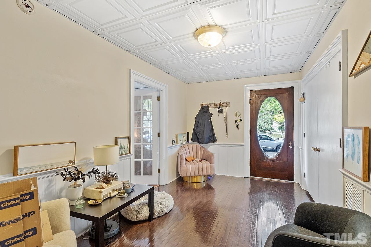 324 Cutler Street Raleigh, NC 27603 - Photo 19 of 34 a living room with furniture and a wooden floor