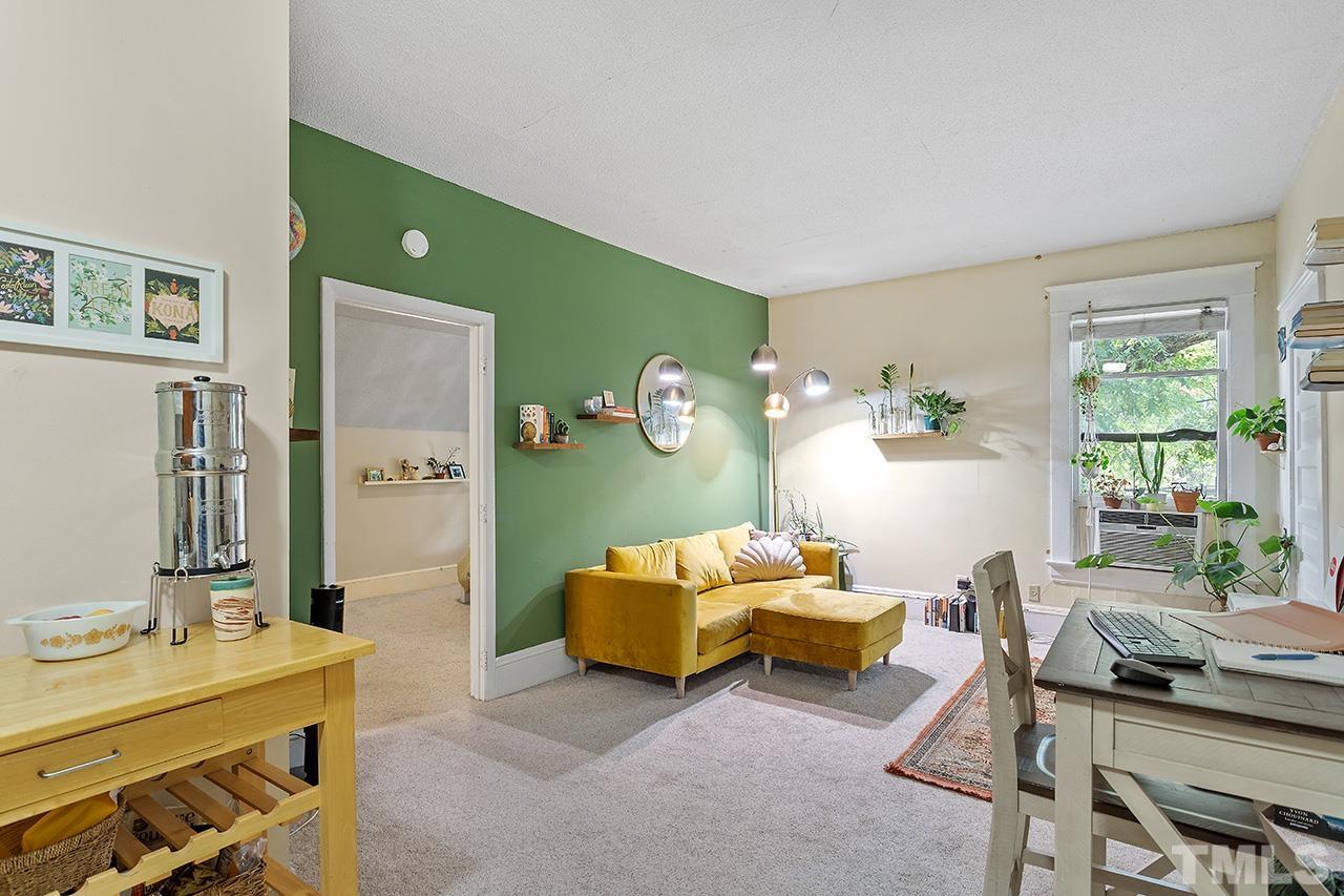 324 Cutler Street Raleigh, NC 27603 - Photo 21 of 34 a living room with furniture and a window