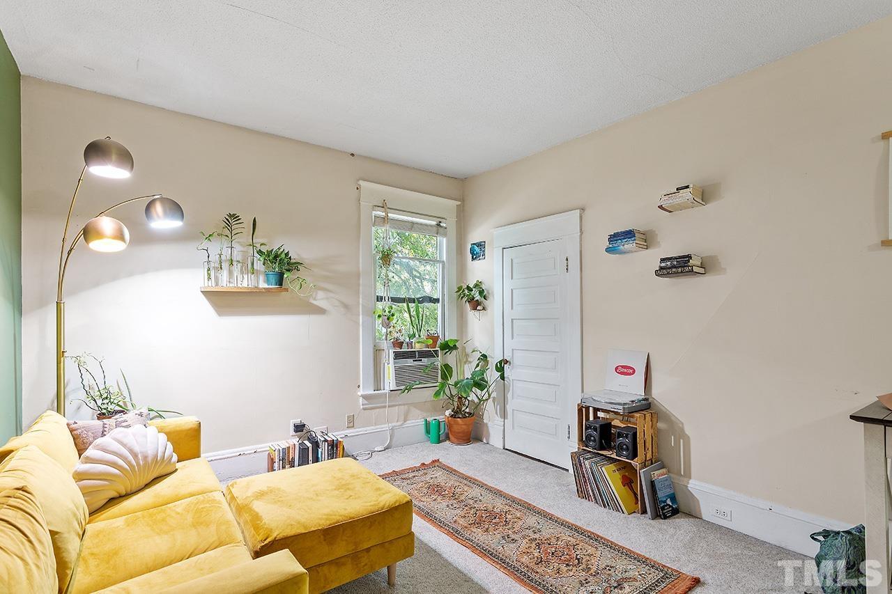 324 Cutler Street Raleigh, NC 27603 - Photo 23 of 34 a bedroom with a bed furniture and a window