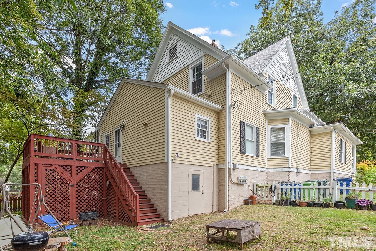 324 Cutler Street Raleigh, NC 27603 - Photo 3 of 34 a front view of a house with garden