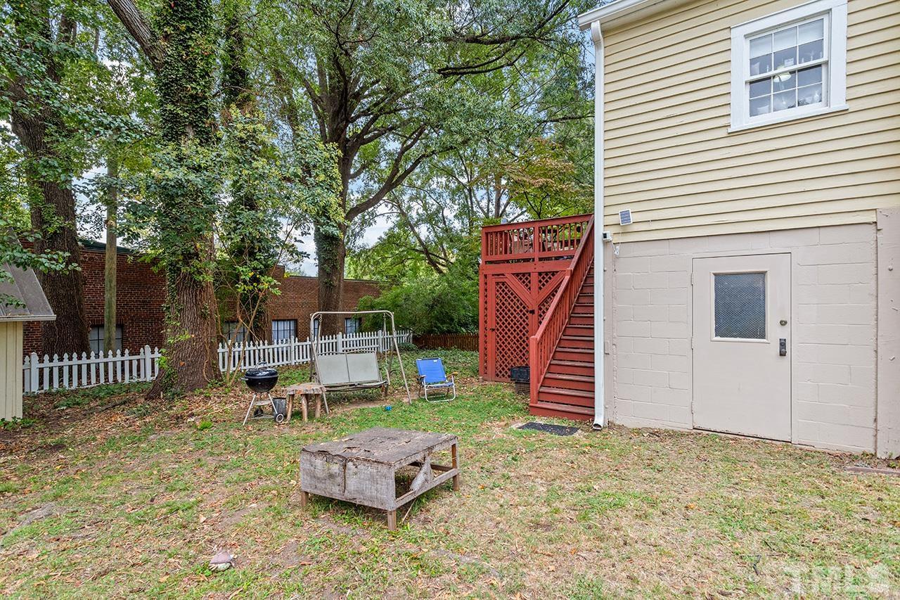 324 Cutler Street Raleigh, NC 27603 - Photo 5 of 34 a front view of a house with garden