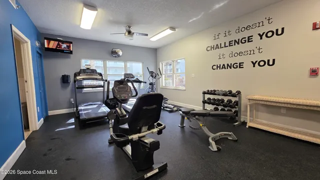 a view of a room with gym equipment