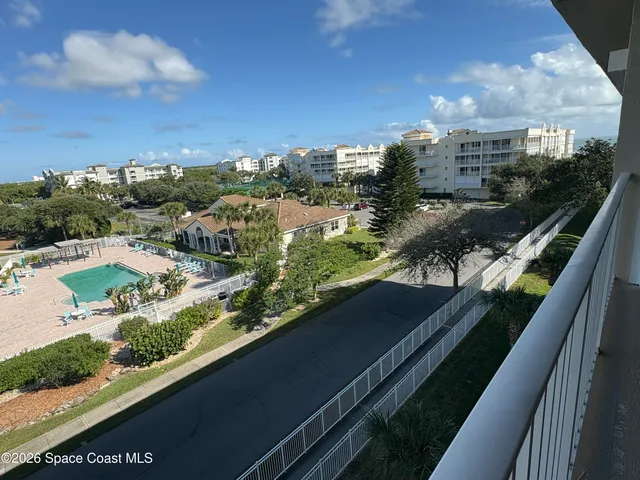 a view of room with furniture and a fireplace