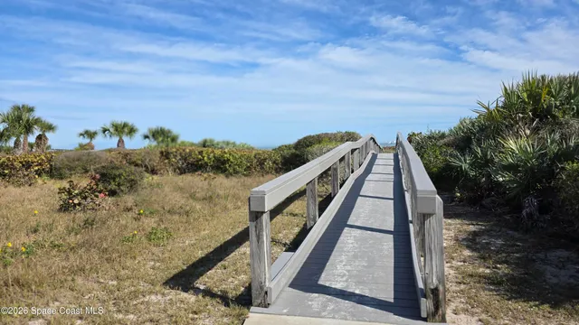 a view of a backyard of a house