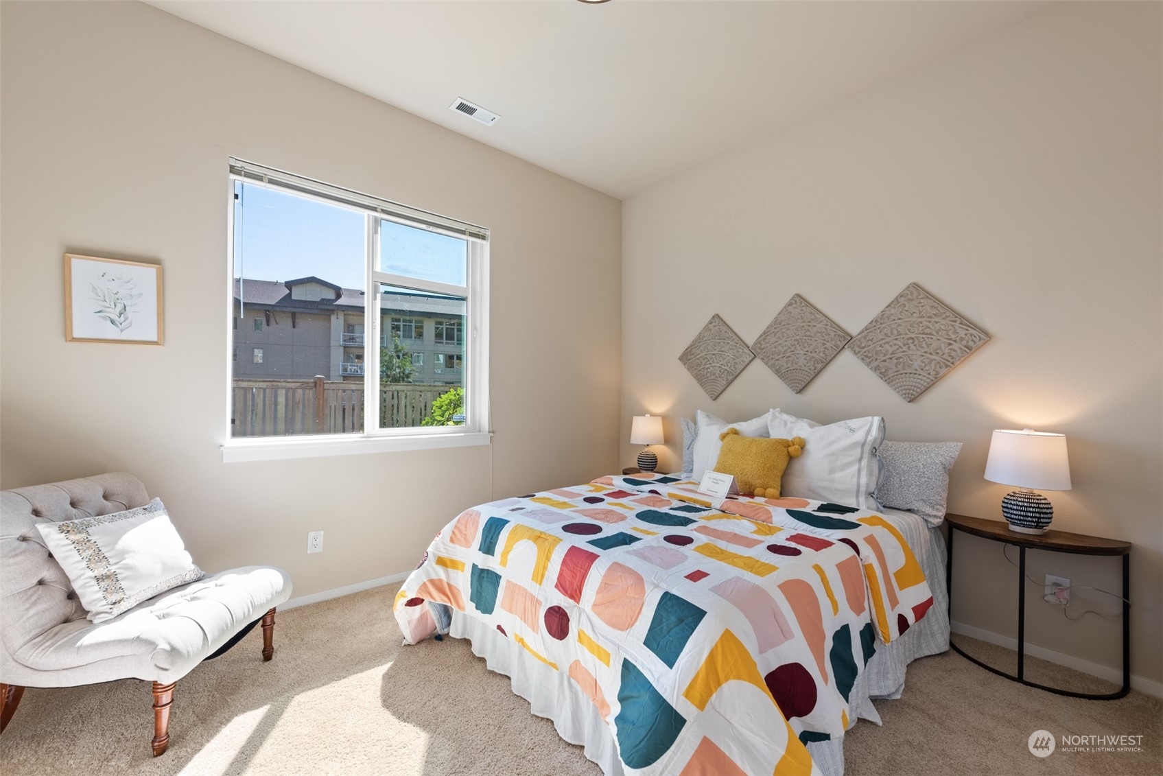 82 Cougar Ridge Road Northwest Issaquah, WA 98027 - Photo 20 of 31 a bedroom with a bed and window