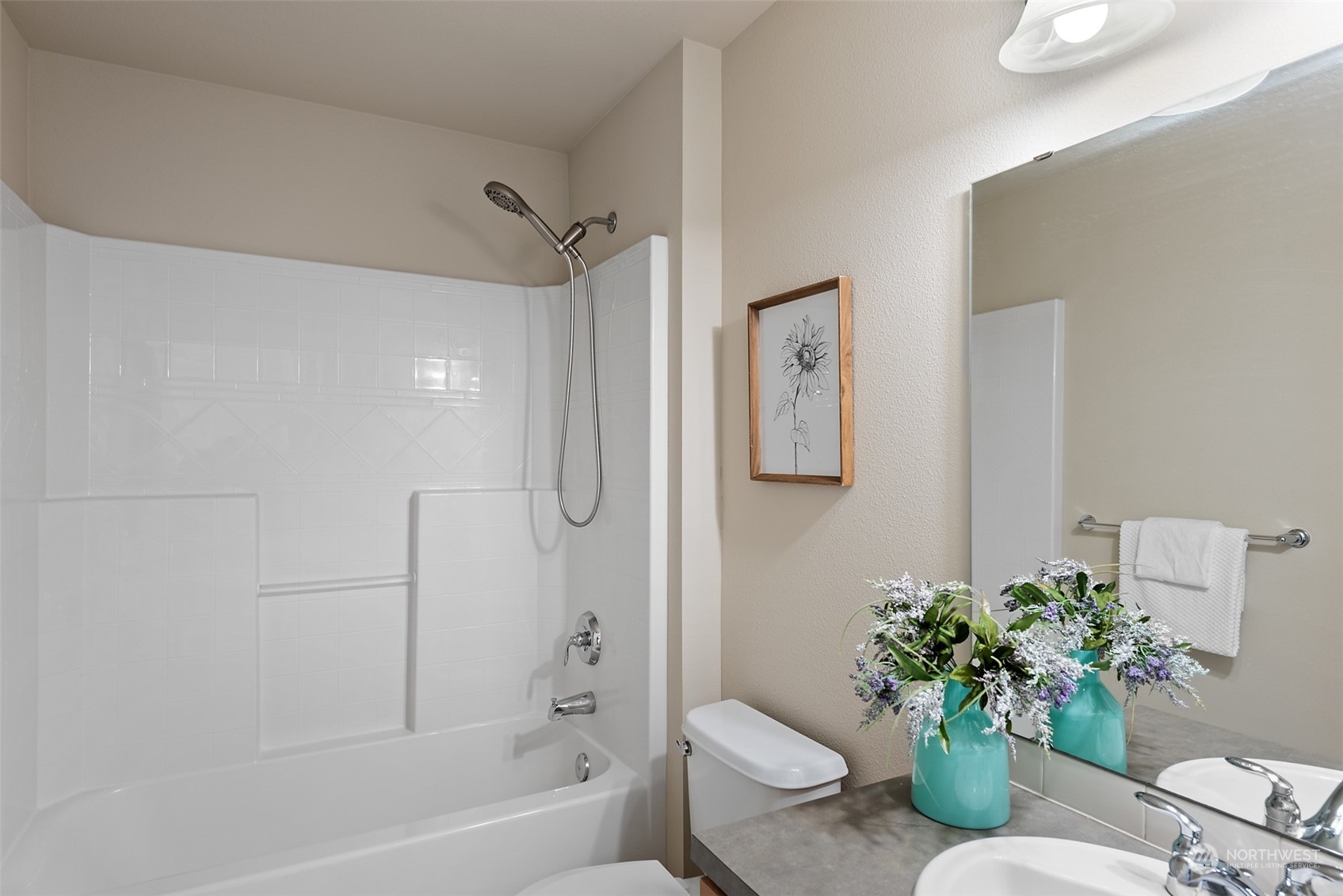 82 Cougar Ridge Road Northwest Issaquah, WA 98027 - Photo 21 of 31 a bathroom with a bathtub sink and toilet