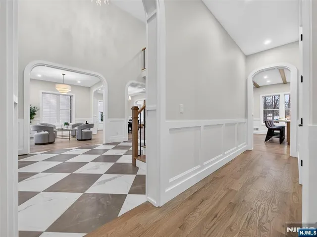 a view of a living room and a wooden floor