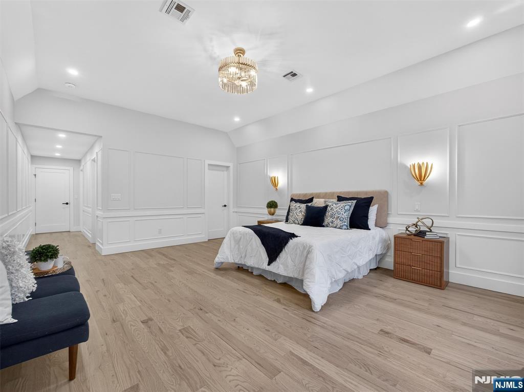 61 Beech Street Ramsey, NJ 07446 - Photo 22 of 41 a spacious bedroom with a bed and window