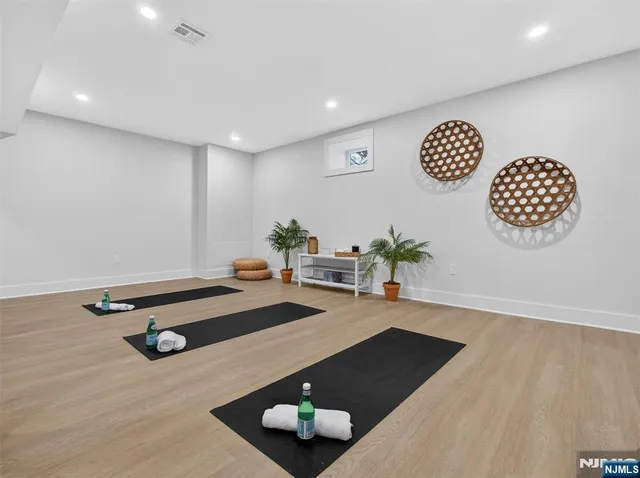 a room with furniture and wooden floor