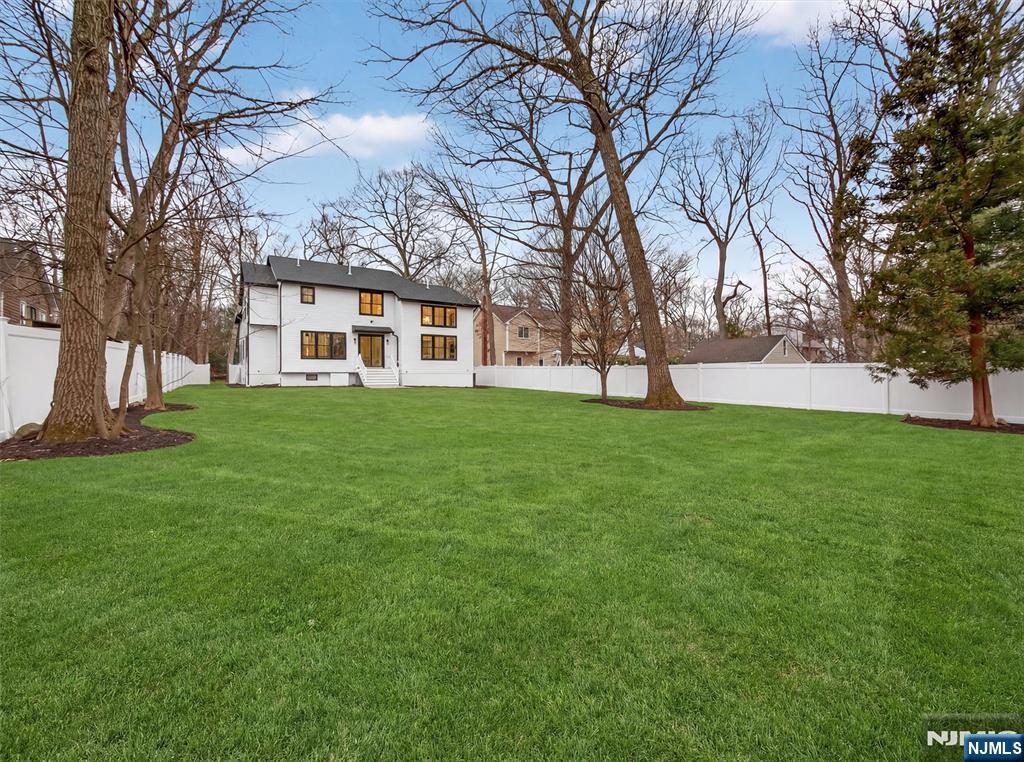 61 Beech Street Ramsey, NJ 07446 - Photo 40 of 41 a view of a house with a yard