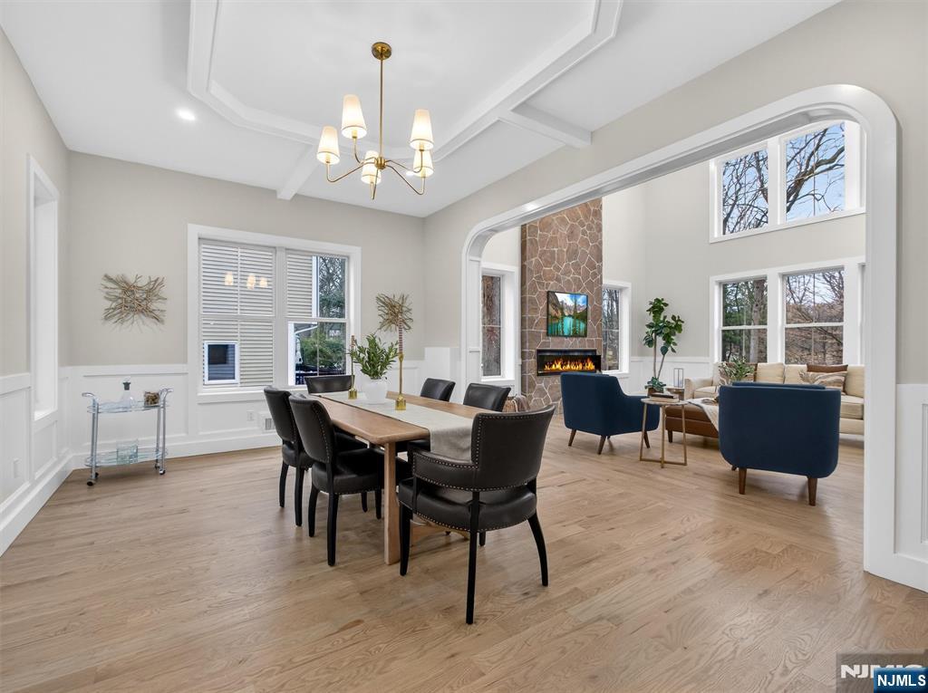 61 Beech Street Ramsey, NJ 07446 - Photo 5 of 41 a view of a dining room with furniture window and wooden floor