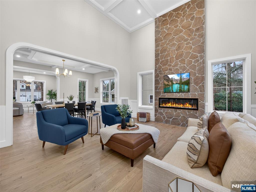 61 Beech Street Ramsey, NJ 07446 - Photo 7 of 41 a living room with furniture and a fireplace