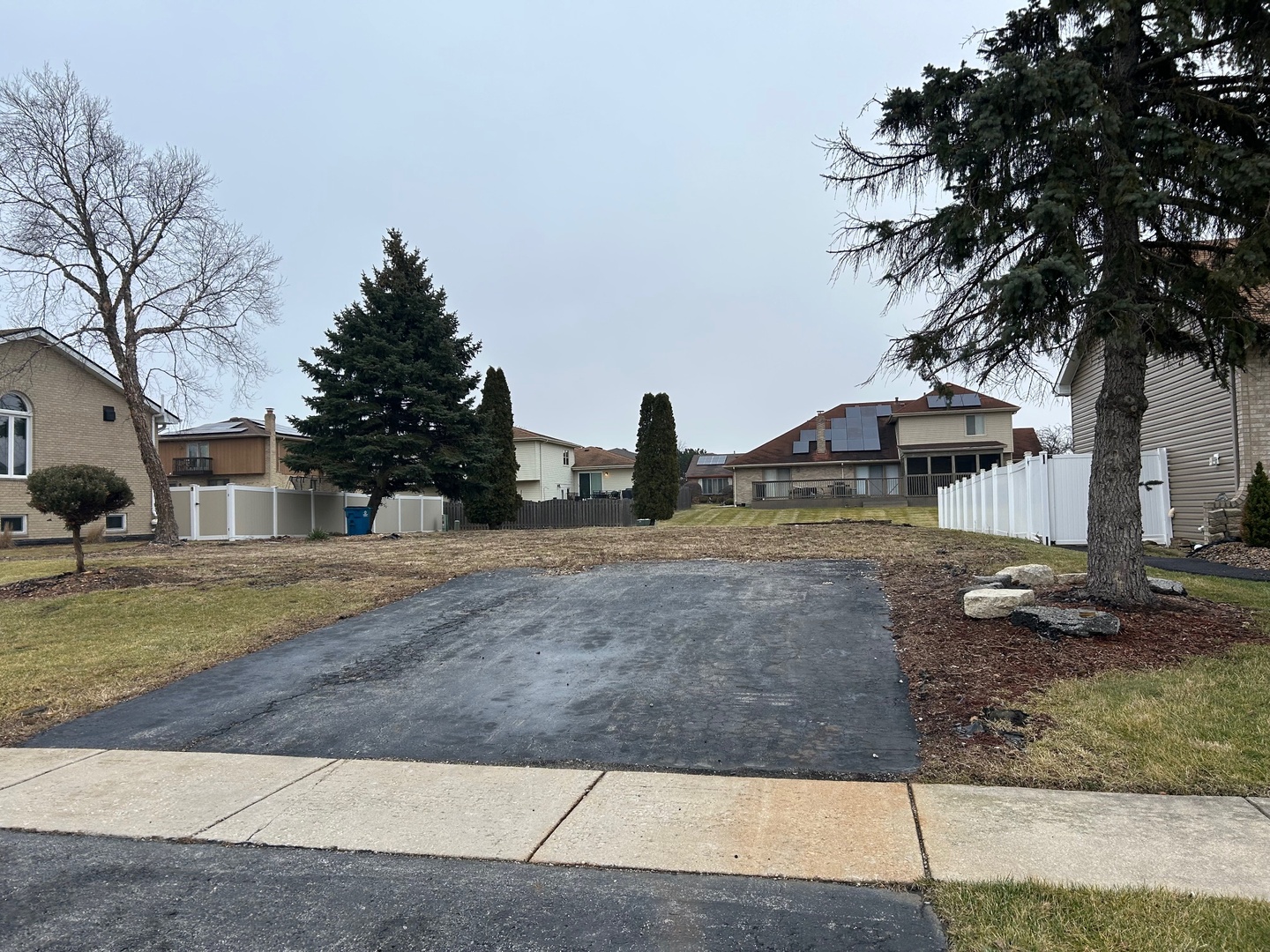 18619 Laramie Road Country Club Hills, IL 60478 - Photo 11 of 13 a view of a street with houses
