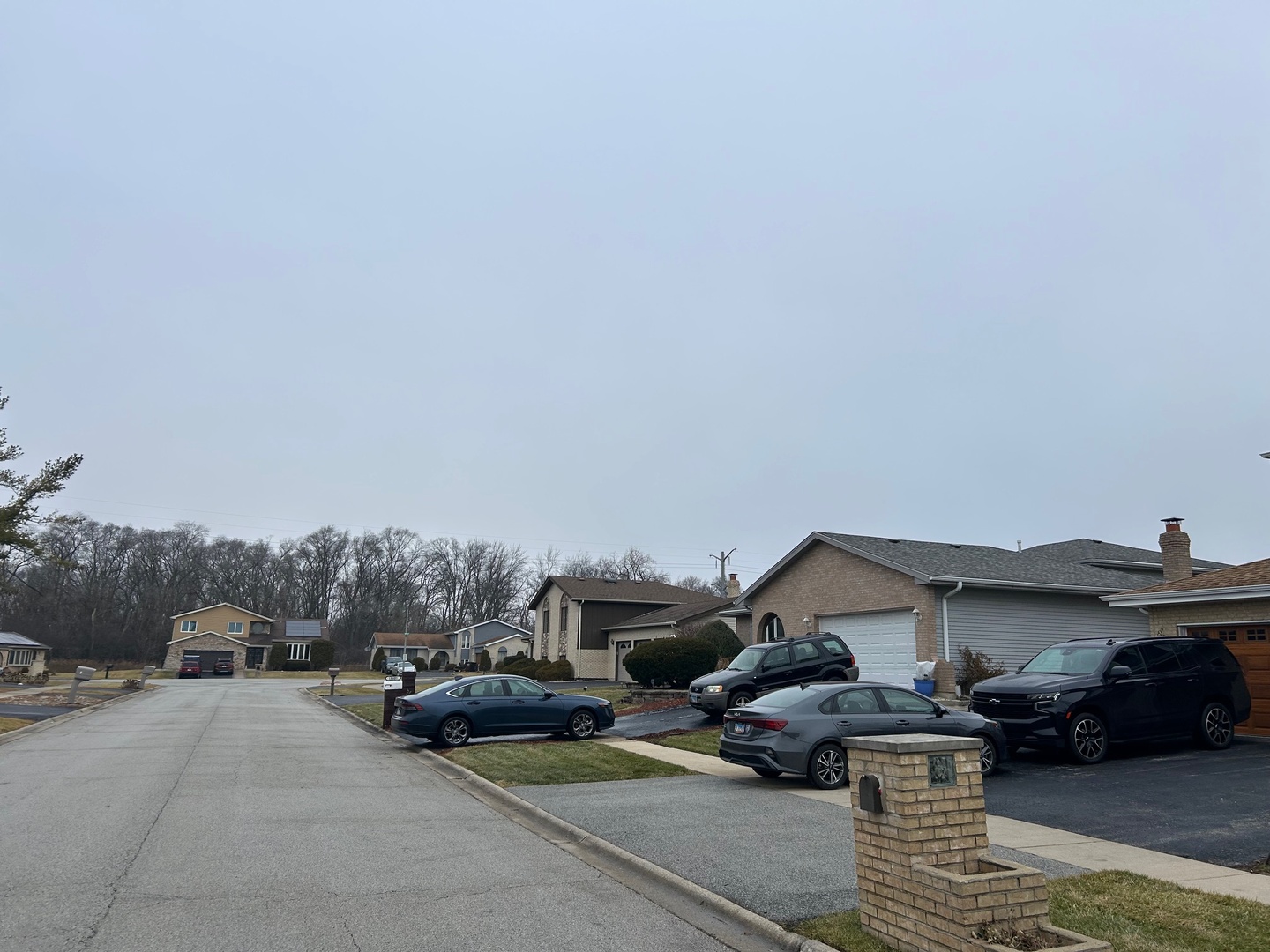 18619 Laramie Road Country Club Hills, IL 60478 - Photo 9 of 13 a car parked in front of a house