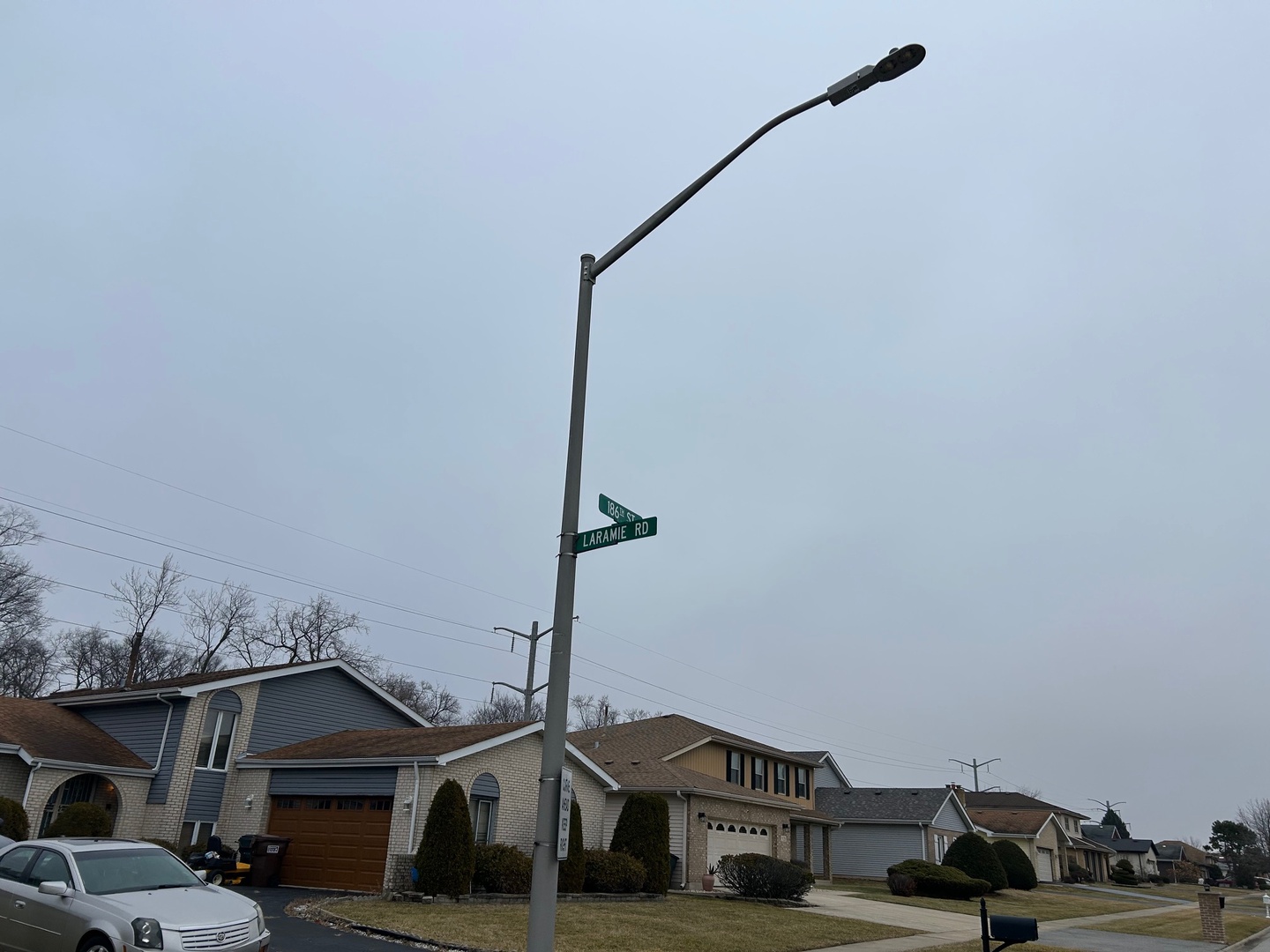 18619 Laramie Road Country Club Hills, IL 60478 - Photo 10 of 13 a car parked in front of a house