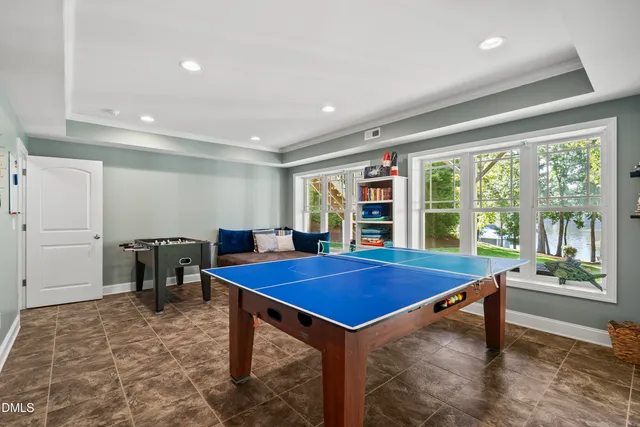 a living room with furniture a rug and a window