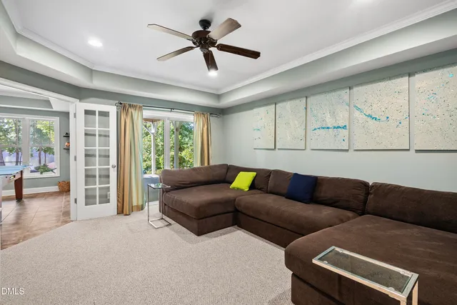 a room with furniture and a large window