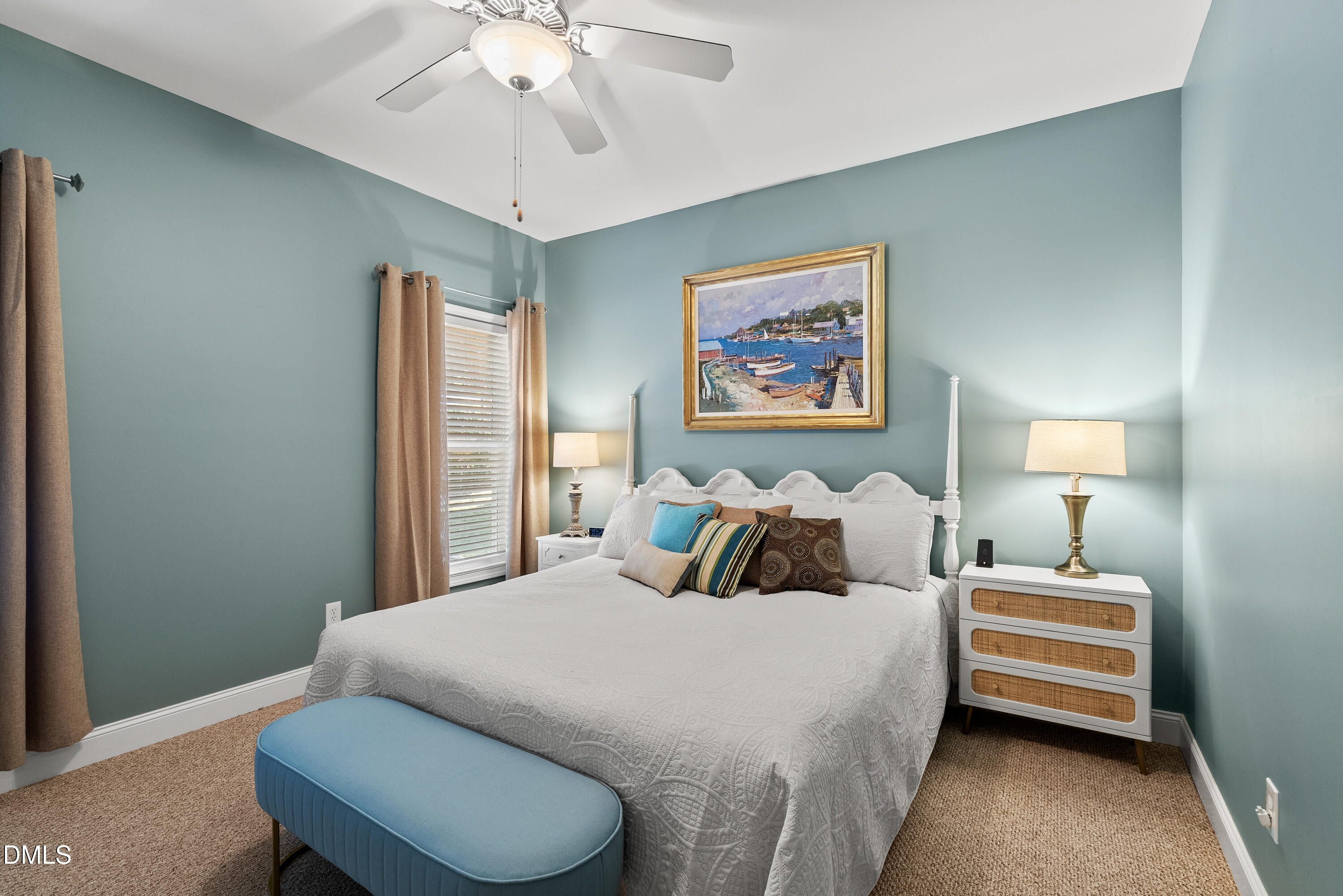 214 Crystal Bay Lane Semora, NC 27343 - Photo 19 of 37 a bedroom with bed and a chandelier